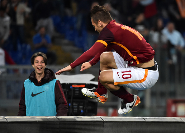 Roma's forward from Italy Francesco Totti celebrates a goal during the Italian Serie A football match between AS Roma and Torino on April 20, 2016 at the Olympic stadium in Rome. / AFP / GABRIEL BOUYS (Photo credit should read GABRIEL BOUYS/AFP/Getty Images)